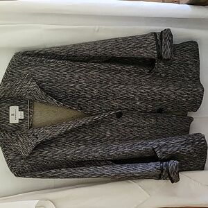 A black and white dress jacket,  size L